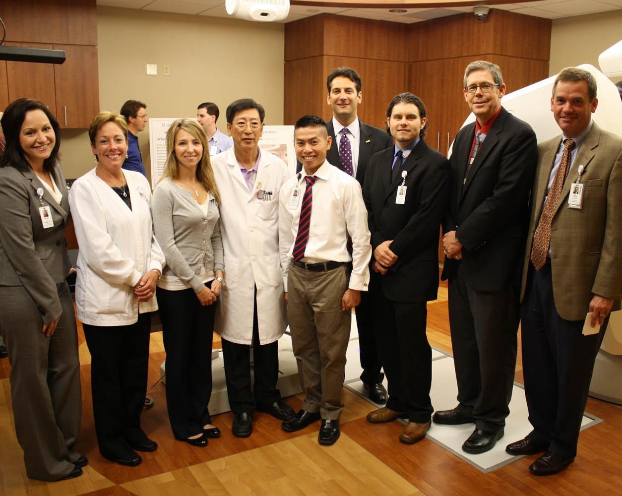 Dr. Bedwinek talks to Open House attendees about CyberKnife technology.