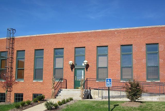 Entrance to the NSVRC office is at the rear of the building.