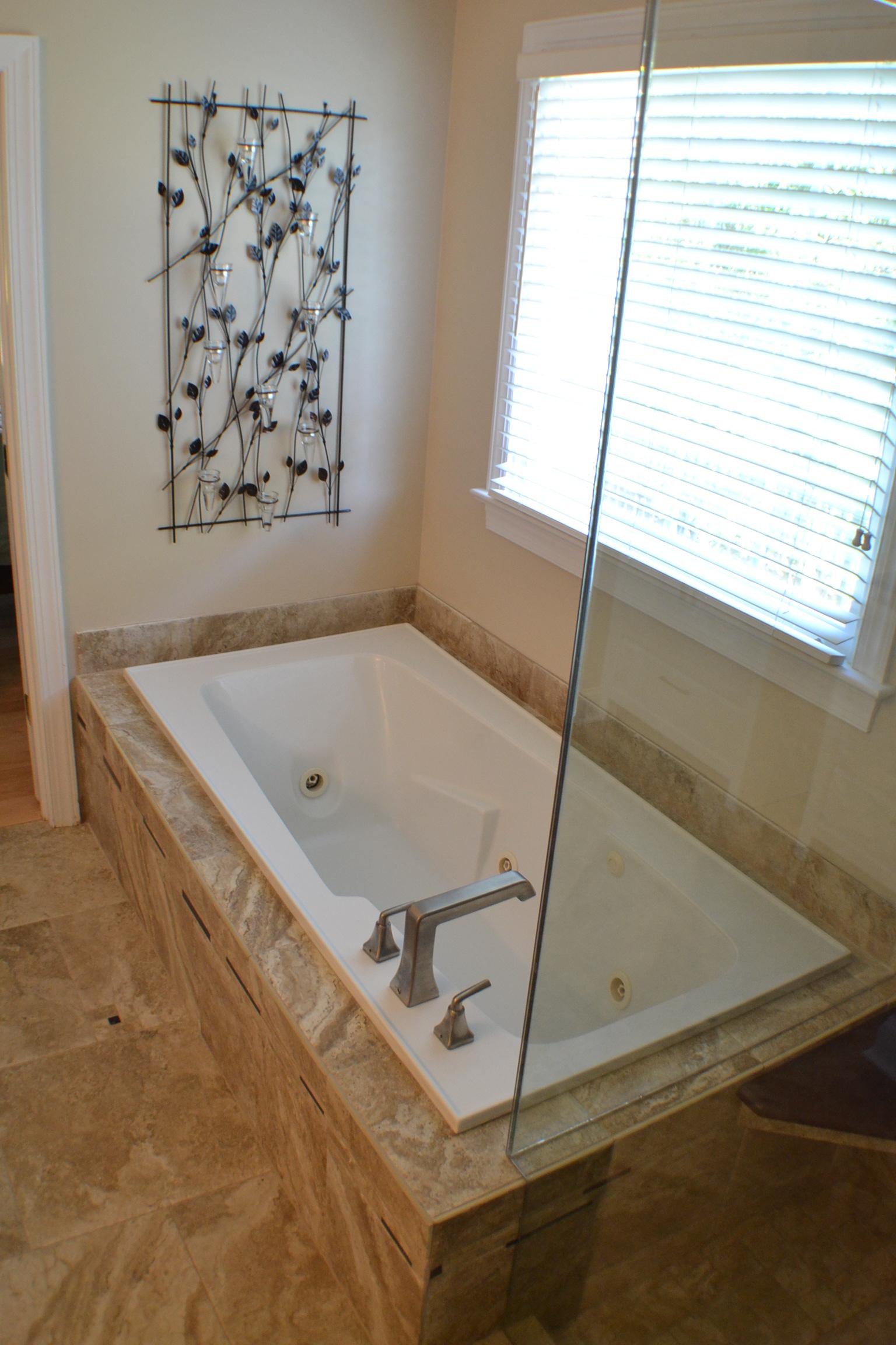 A full bathroom refit including porcelain tile wrap and frameless glass shower enclosure really brought this bathroom back to life!