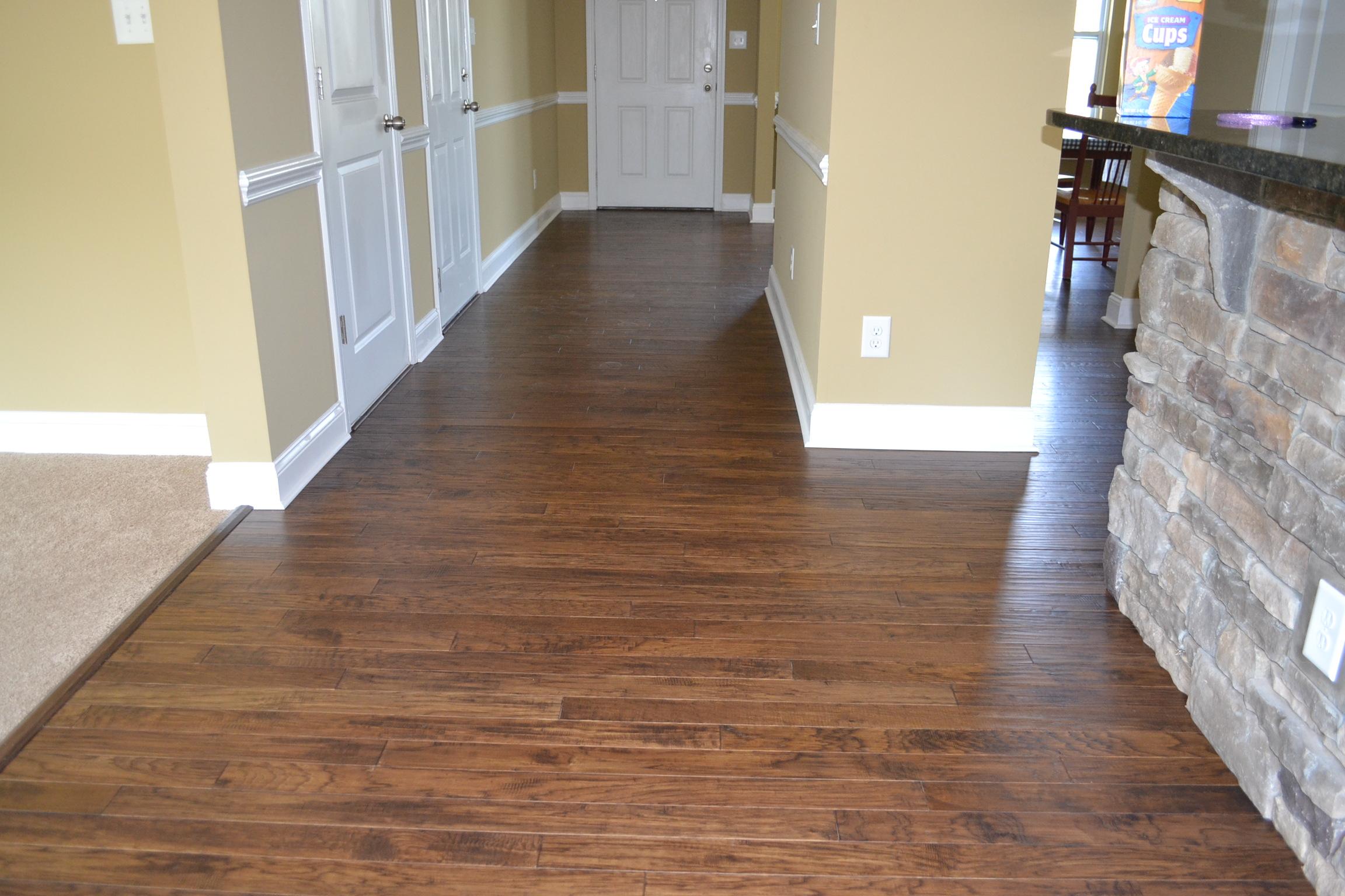 Our customer wanted style, durability, but at a budget. This 3" handscraped engineered Hickory worked perfectly!