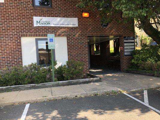 Handicapped parking in rear parking lot of Holistic Pain and Wellness Specialists.