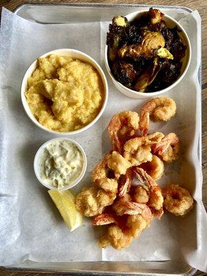 Fried Fresh Local Shrimp, stone ground grits, and smoked molasses brussel sprouts.