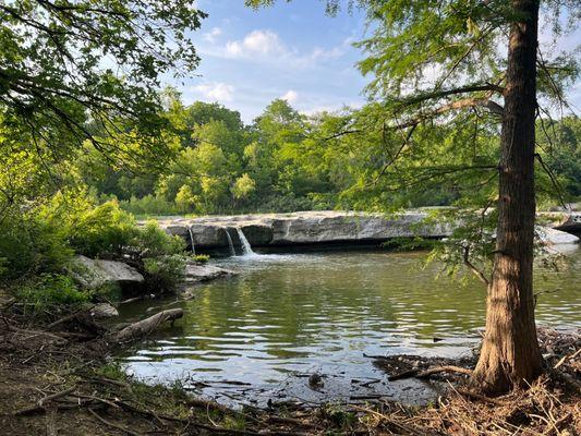 Lower falls with a beach.