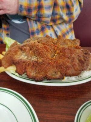 Bistec apanado: pounded, breaded, fried steak w rice and fries