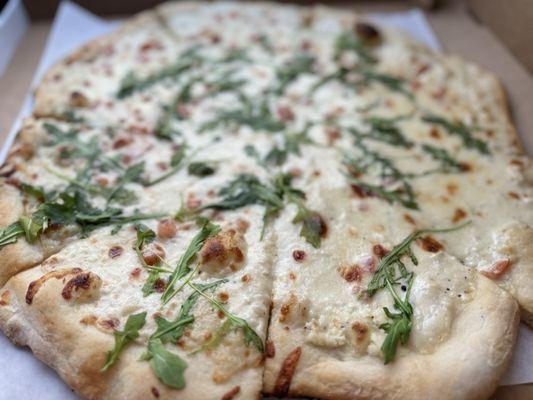 White pizza w added arugula and tomatoes (very small, barely there pieces of tomato - not worth the $2 extra).