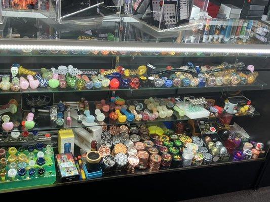 Glass pipes, bowl pieces and grinders.