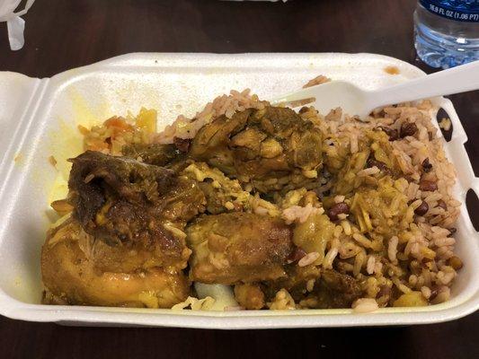 Curry chicken, rice and peas (beans), cabbage