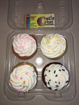 Strawberry, lemon, chocolate, and confetti cupcake.