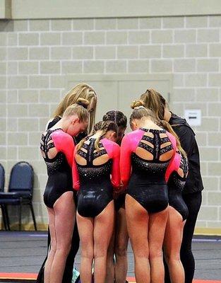 Team prayer before a competition