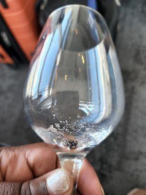 Something was in my glass of Ros`e wine... it was not sugar and it was not salt!! Almost like plastic.