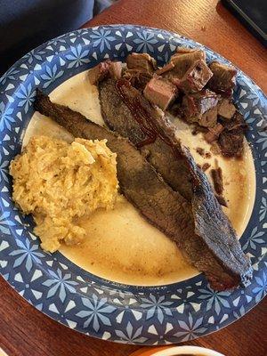 Burnt ends, brisket and cheesy potatoes.