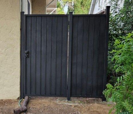 A steel gate and fence