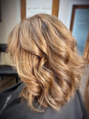 Warmer, dimensional highlights and shorter haircut