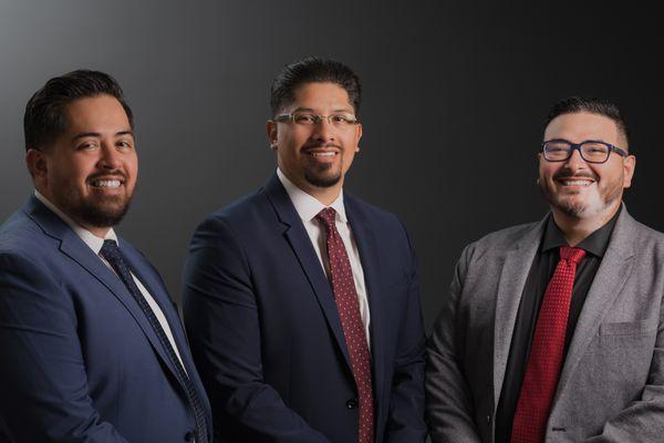 Office Manager Carlos, State Farm Agent Josue, and Team Member Rafael