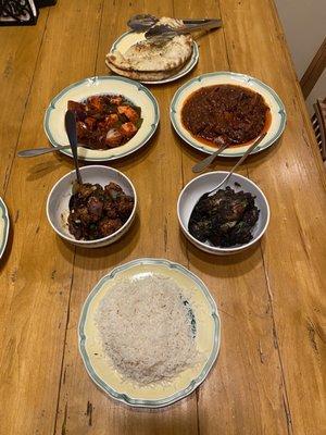 plain rice, Jerk Tandoori Wings, Goat Vindaloo, Rosemary Garlic Naan, Chili Paneer, Gobhi Manchurian.