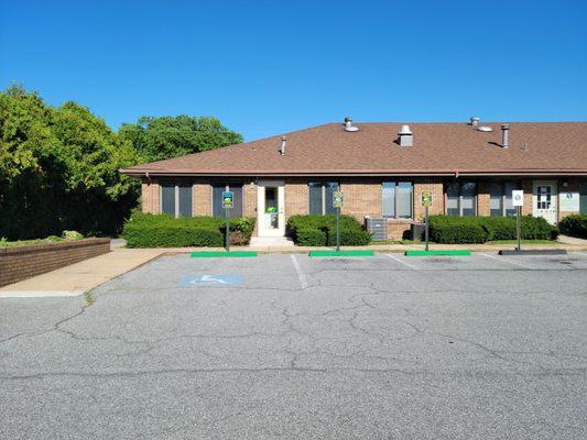 Rear of the office offers additional parking including handicapped accessible parking