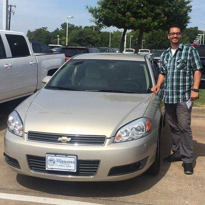 My fiancé and his new 2011 Chevy Impala!