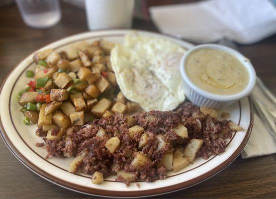 Corned beef hash brisket w/ eggs (and gravy).