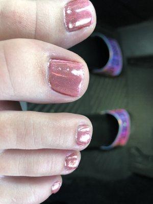 Messy application. You can see the paint on my skin (2nd & 3rd toe.) You can see the paint under the "chrome" on the side and tip of my nail