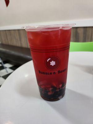 Fresh strawberry fruit tea with boba