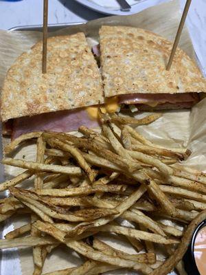 One slice turkey, 2 slices ham and fake american cheese. Club and fries