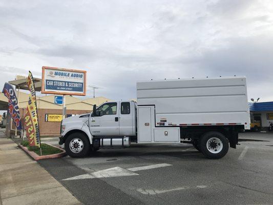 Yes, we can work on these trucks too! Adding camera and In-dash touch-screen for safety purposes.