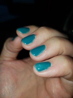 Uneven coverage and top coat missing on sides of every nail.