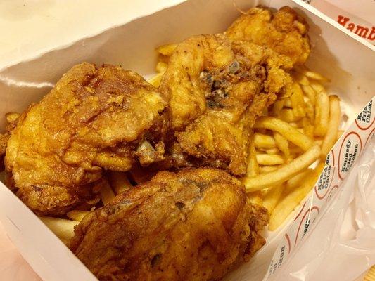 Fried chicken with seasoned fries (They also have the option of Tostones or Rice if you prefer to order with that)