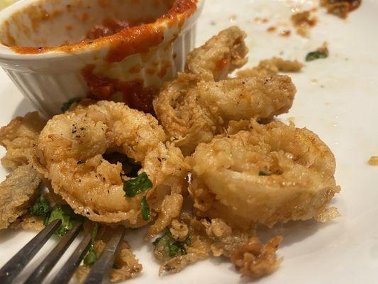 Calamari--rubbery.  Do not recommend.