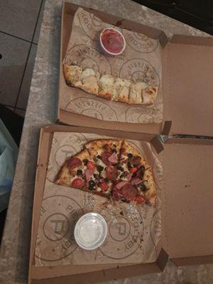 Pizza and garlic cheese bread