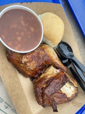 Smoked chicken with baked beans and dinner roll