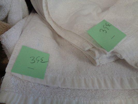 $3.99 for a thin "motel stolen" used white towel !! CRIME !