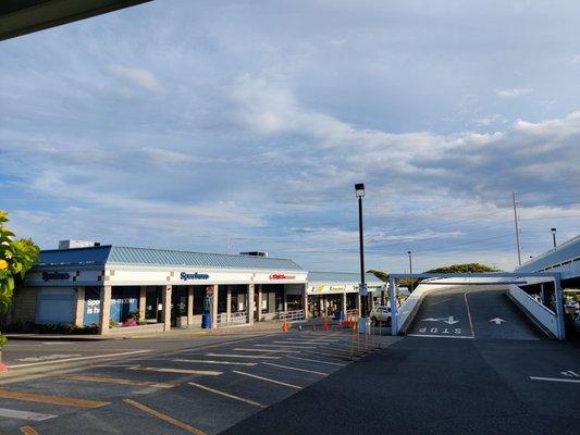 The ramp up to the second parking level is next to Spectrum and one of the entrances to the shopping center