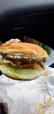 Cheese burger with grilled onions and mushrooms