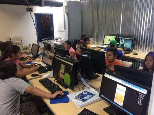 Summer Camp Kids working on their tech projects at the Bell Tech Center.