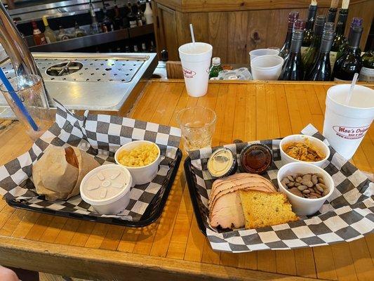 Pulled Pork Sandwich Meal Bama style and Smoked Turkey Platter with butter beans and sweet potato casserole.