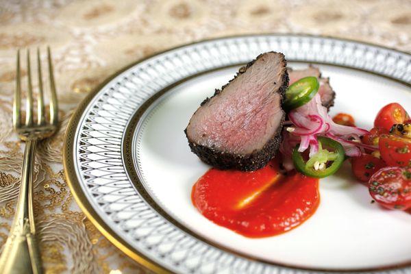 Santa Maria Tri-Tip Steak, with Roasted Pepper Coulis, Pickled Onion, Jalapeno and Tomato Salad