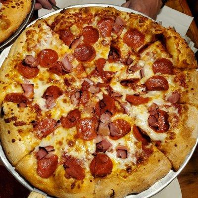 Pepperoni and ham traditional pizza