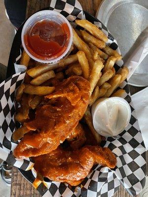 Chicken strips tossed in buffalo sauce