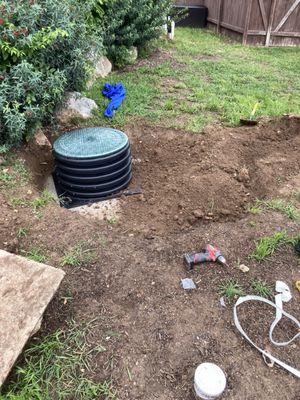 Septic tank riser install.