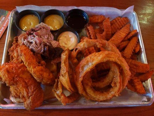 Pick two! This one included the tenders and pulled pork. Sweet potato fries and onion rings.