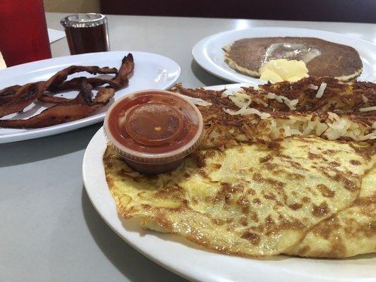 Omelette and has browns.