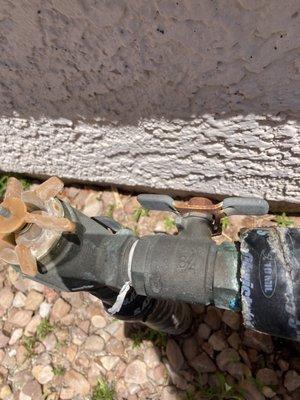 Sediment of leaking pipe indicates it's been going on for a while with no notification or regard from the landscaping