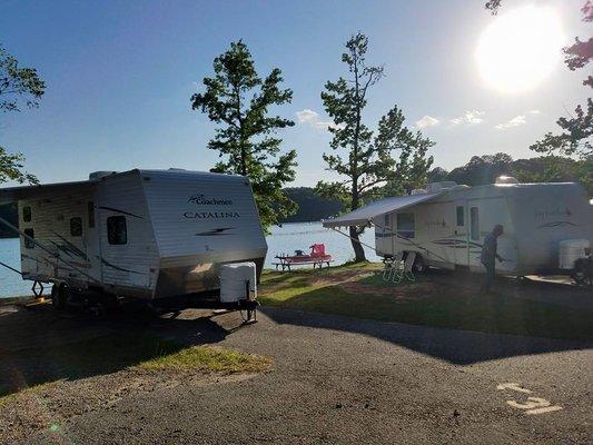 Campers set up near the water