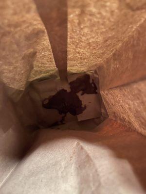 Chocolate long John frosting in bag