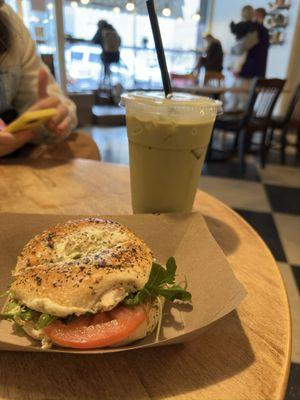 Iced matcha latte and bagel.