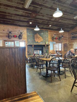 Main entrance....nice fireplace (and tobacco leaf wall art)