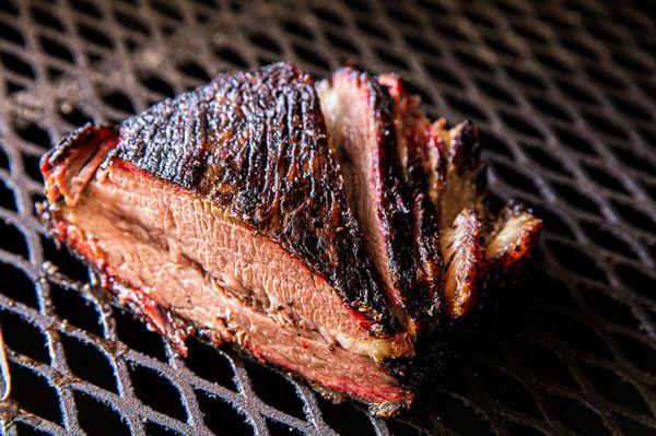 Mesquite Smoked Beef Brisket with that 200 year old south Texas flavor, dalmatian (salt and pepper) rub.