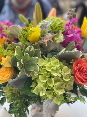 Centerpieces, bright curriculum floral arrangements for rehearsal dinner for our wedding at Lafayette park hotel!