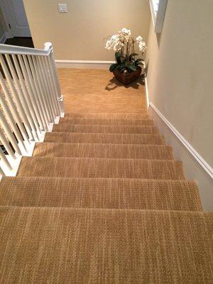 Beautiful wool carpet on stairs.